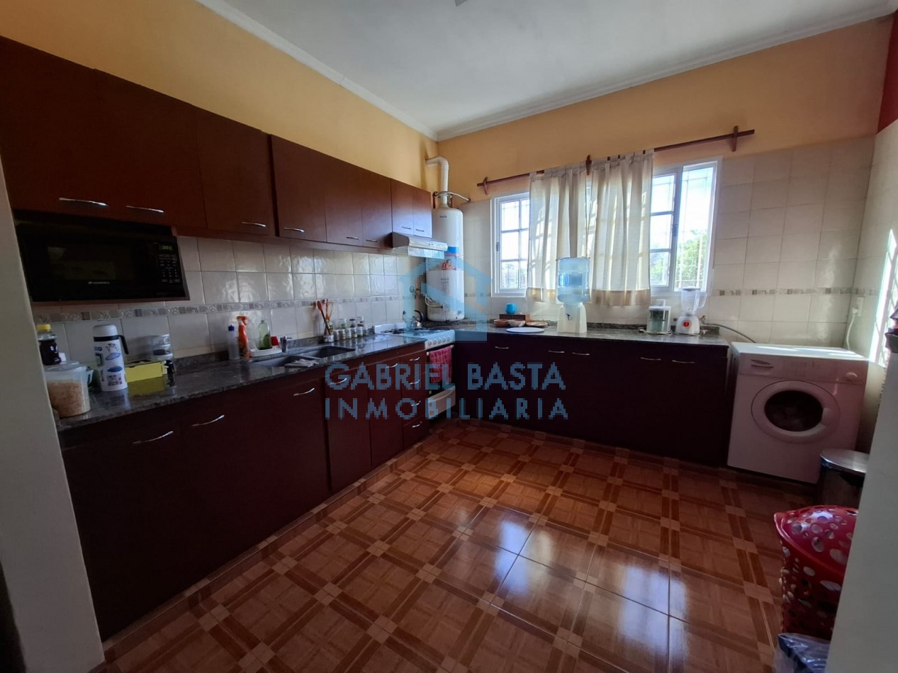 3 casas en bloque en Merlo centro